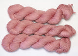Merino knitting yarn in mid toned pink