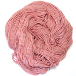 Merino knitting yarn in mid toned pink 